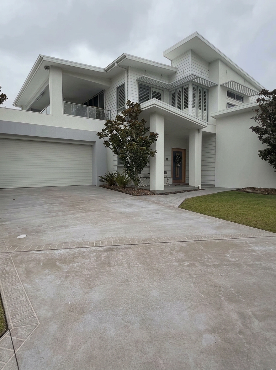 Driveway before pressure washing and sealing